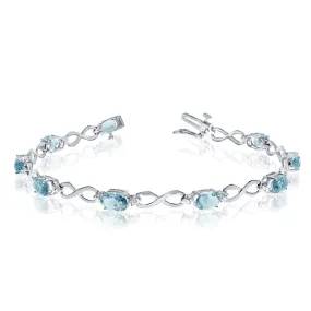 10K White Gold Oval Aquamarine Stones And Diamonds Infinity Tennis Bracelet, 7"