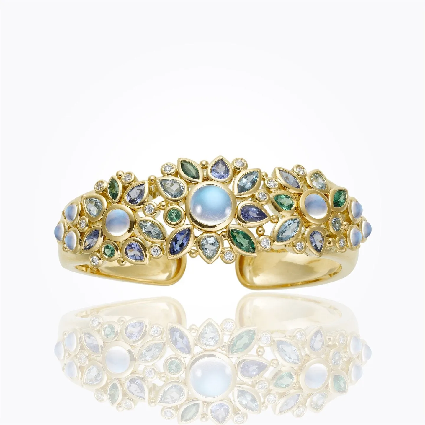 18K Anima Cuff Bracelet with royal blue moonstone, aquamarine, tanzanite, tsavorite, and diamond