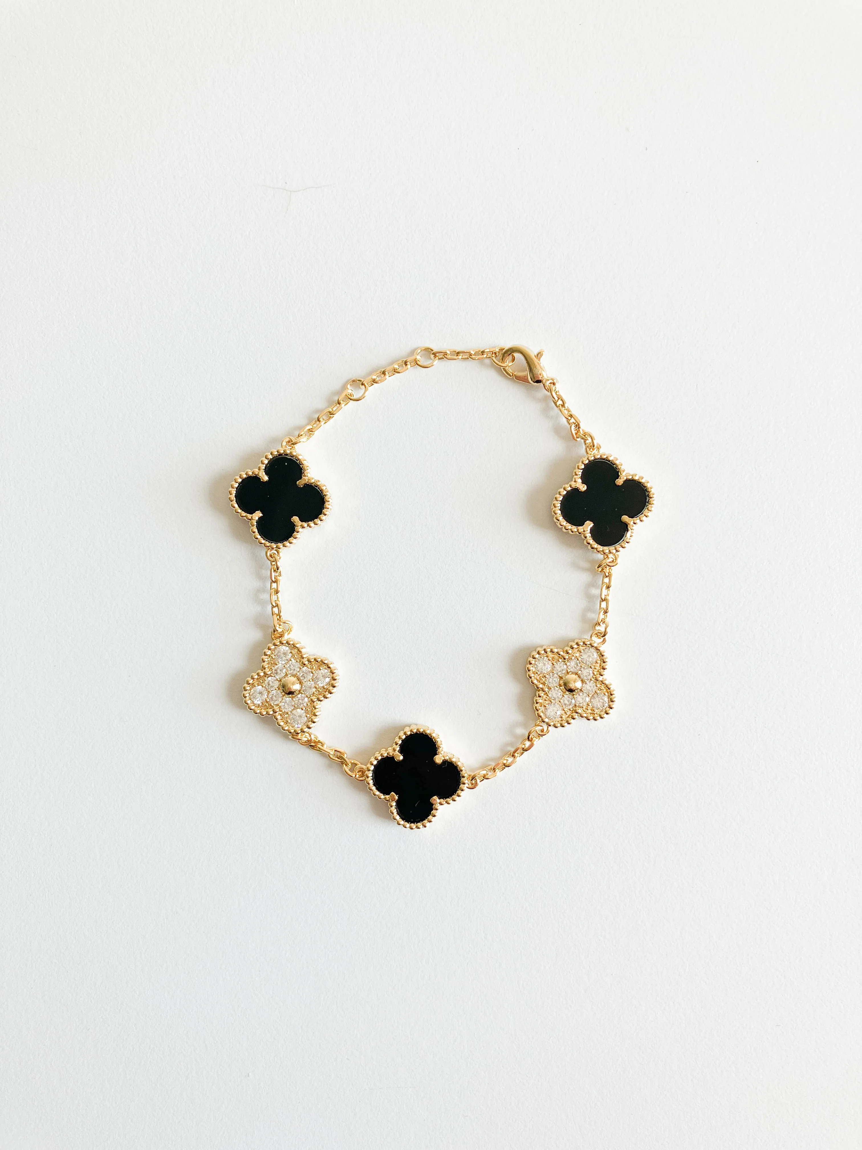 Cubic Zirconia and Onyx Demi Quatrefoil Bracelet in Gold