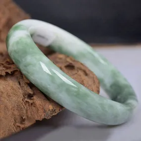 Floating green jade bracelet