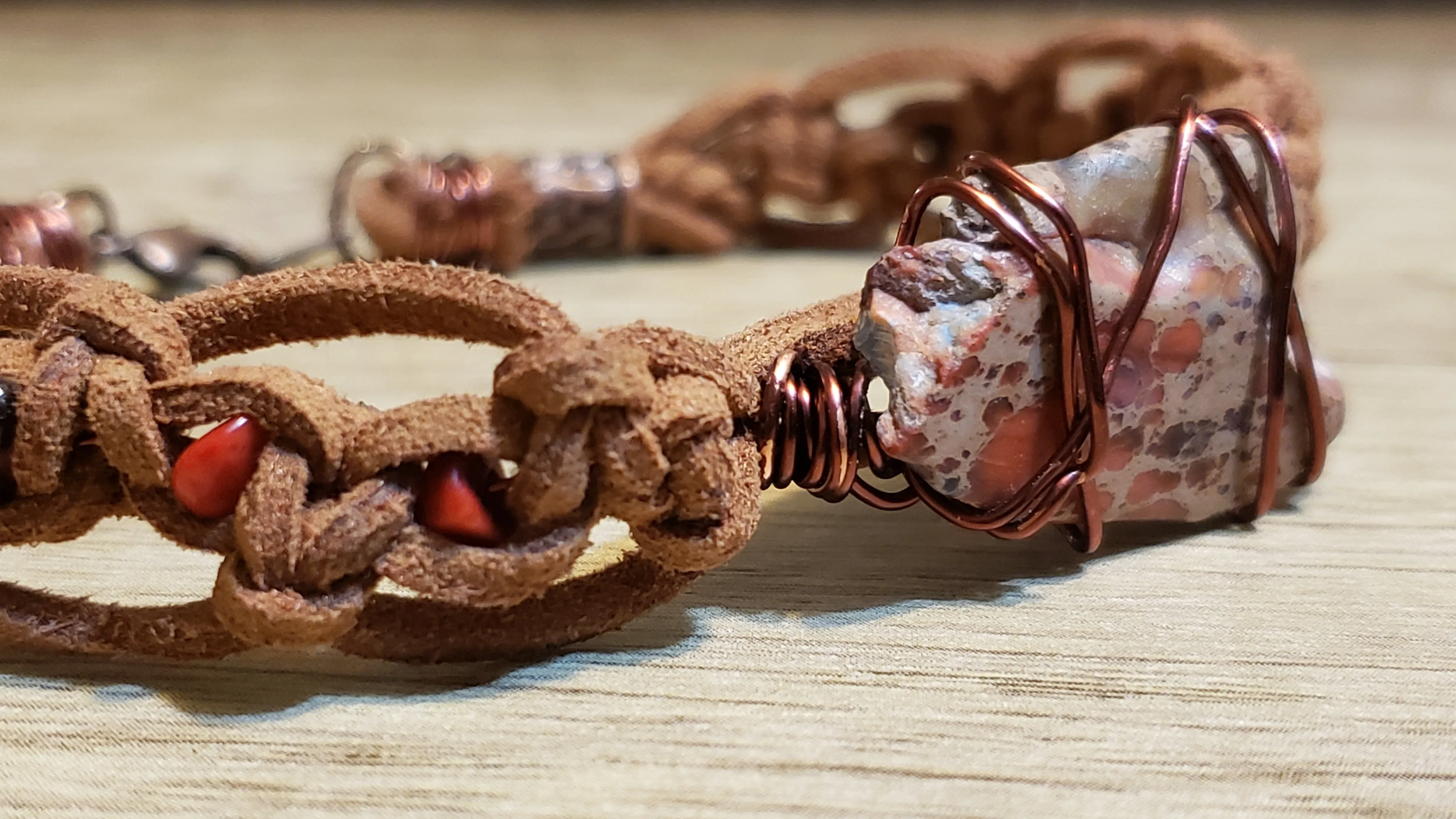 Genuine Leather (Large Size) Bracelet with Red Coral, Garnet, Copper Wrapped Stone Focal & Lobster Claw Clasp.
 