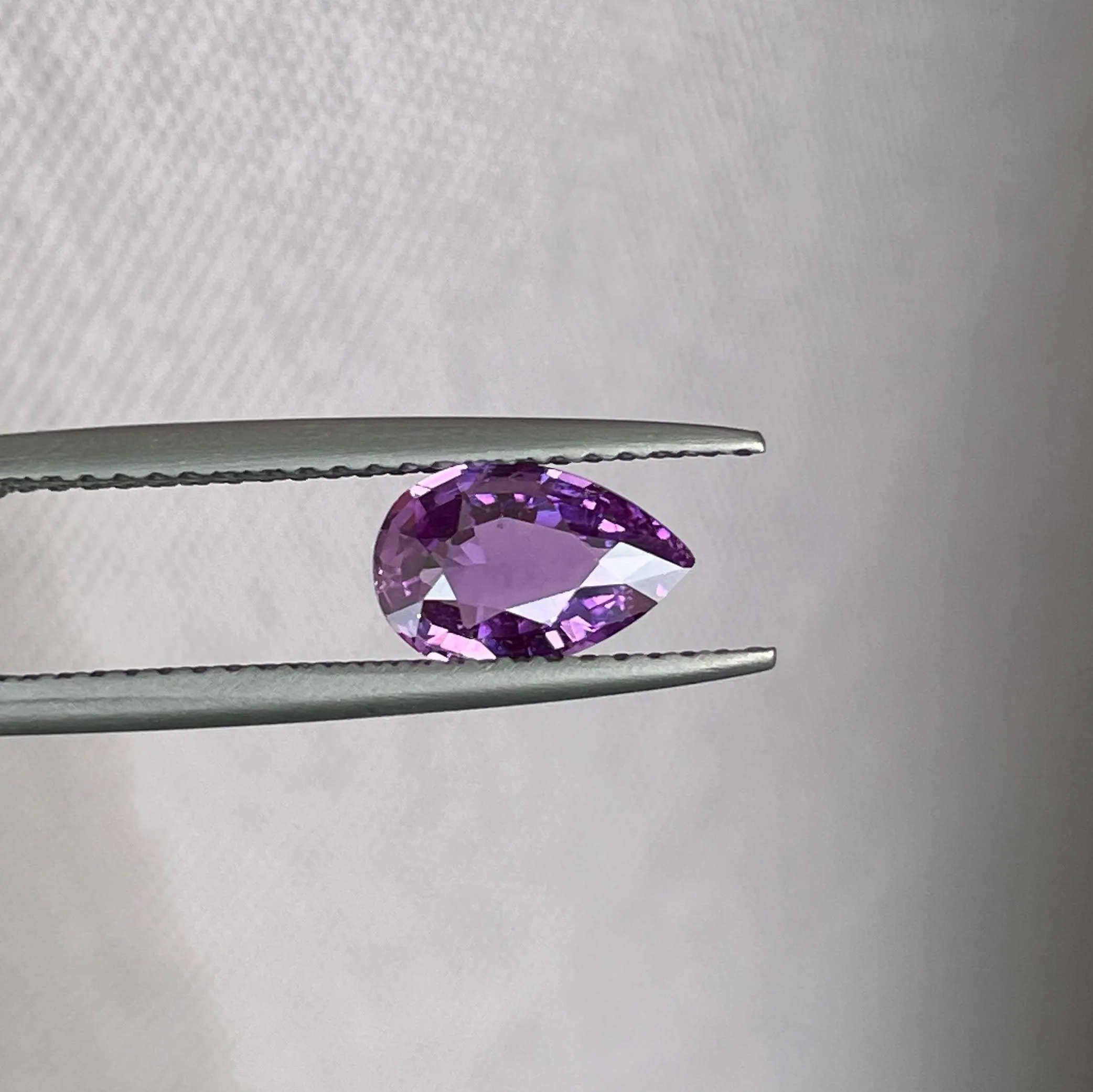 loose purple sapphire 1.08 crt purple pink sapphire online,  selling loose gemstones online for october birthstone jewelry as fiance ring, made to order engagement rings in new world gems selling loose gemstones online