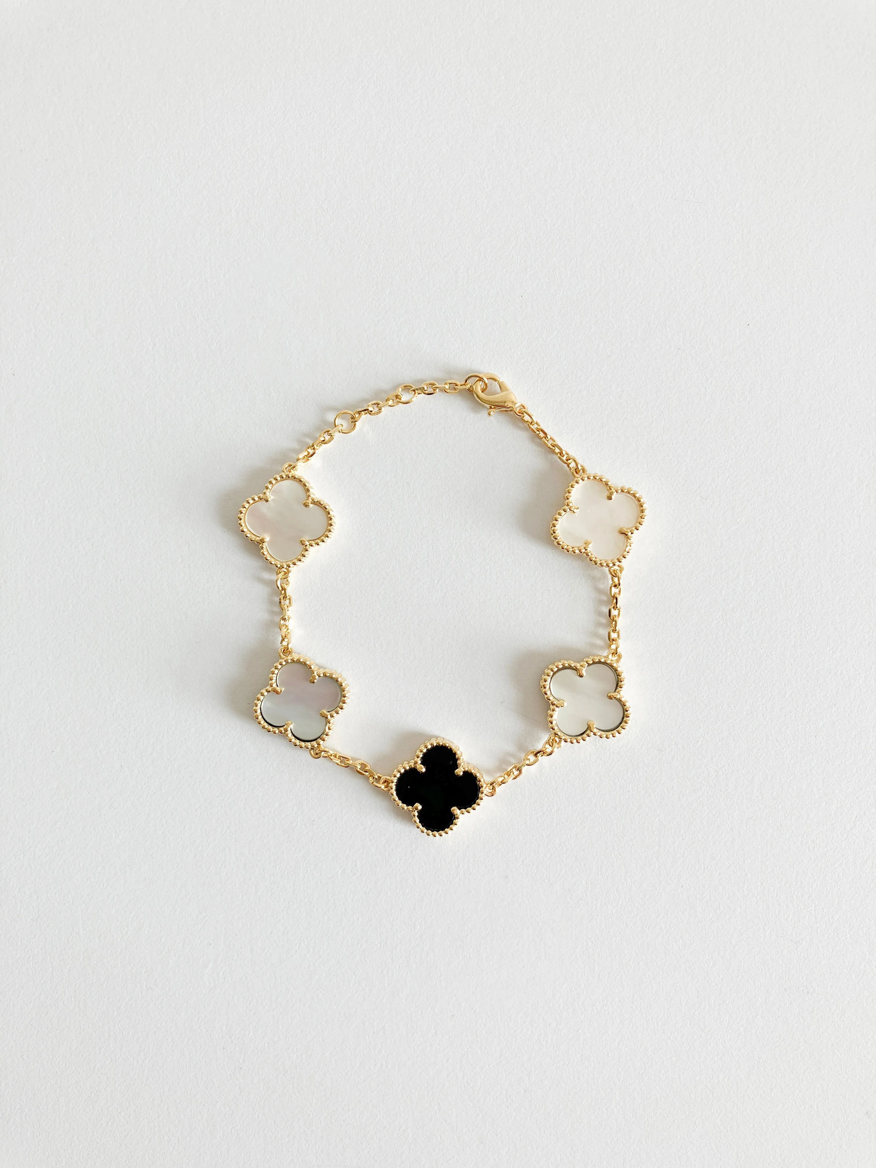 Mixed Mother of Pearl and Onyx Demi Quatrefoil Bracelet in Gold