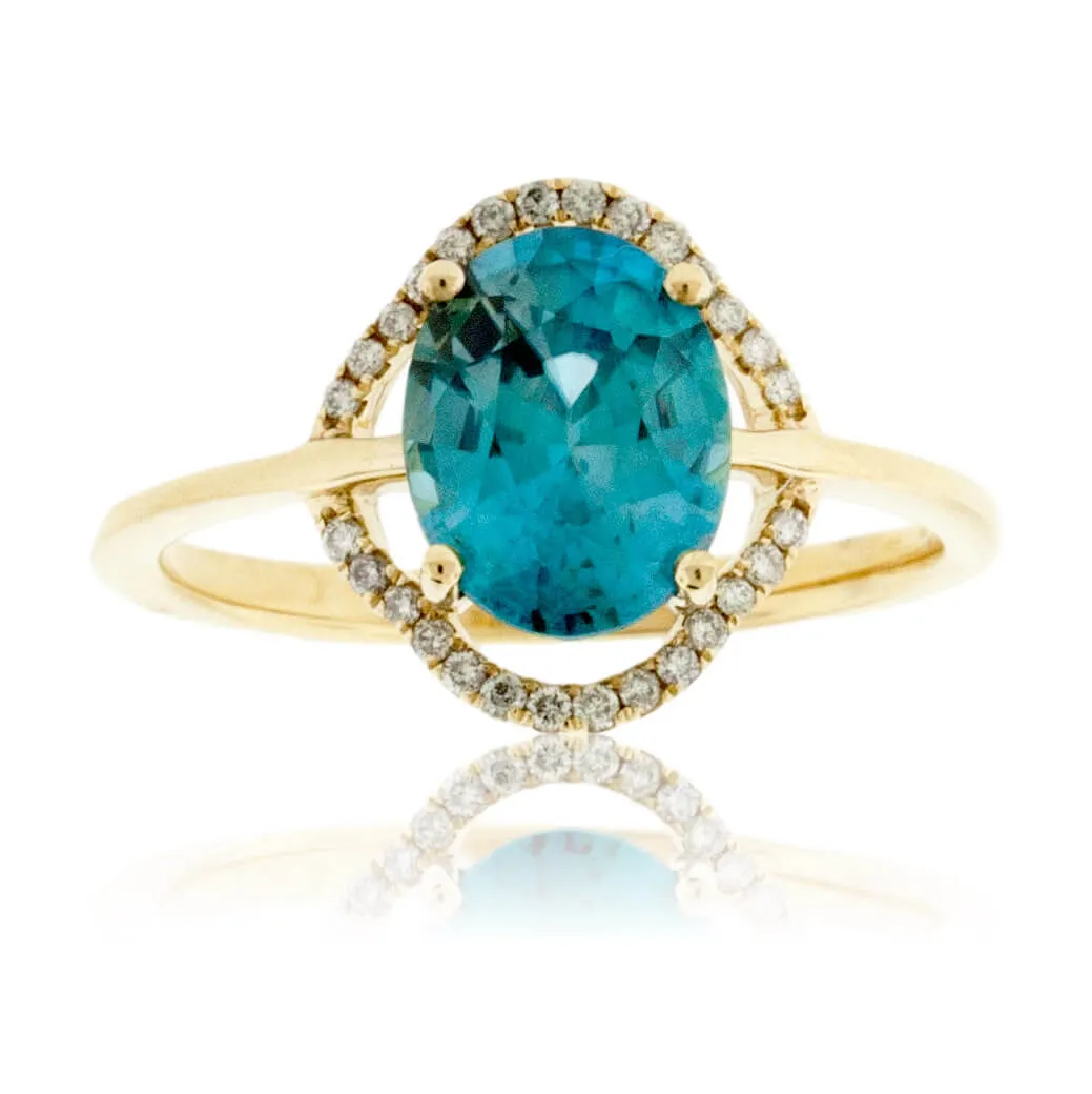 Oval Cut Blue Zircon & Diamond Halo Style Ring