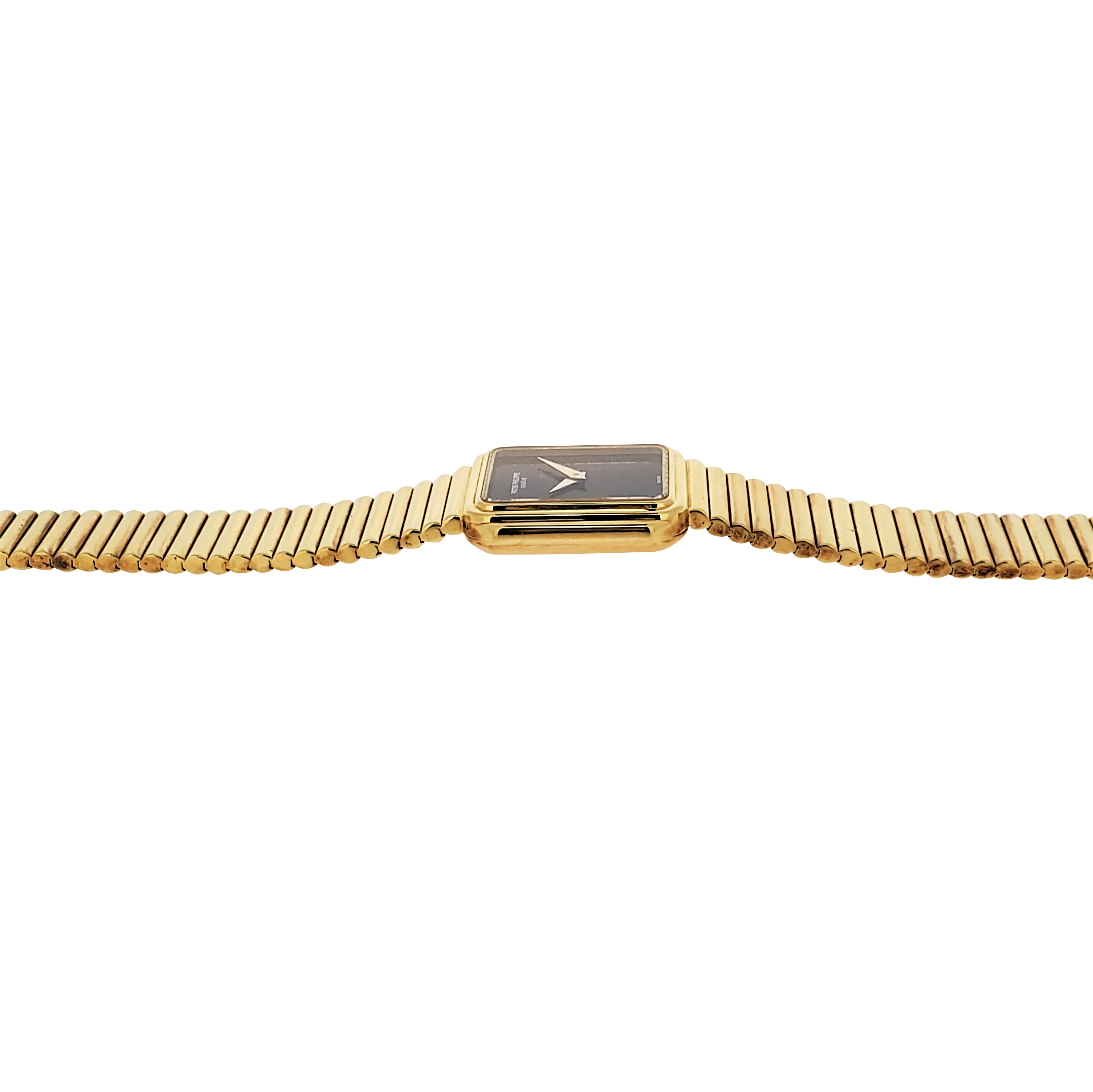 Patek Philippe Ladies 4429/1J Gold Bracelet Watch with Onyx Dial, Circa 1991