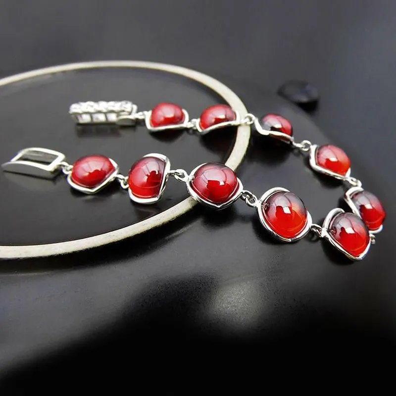 Polished Garnets in S925 Thai Silver Bracelet