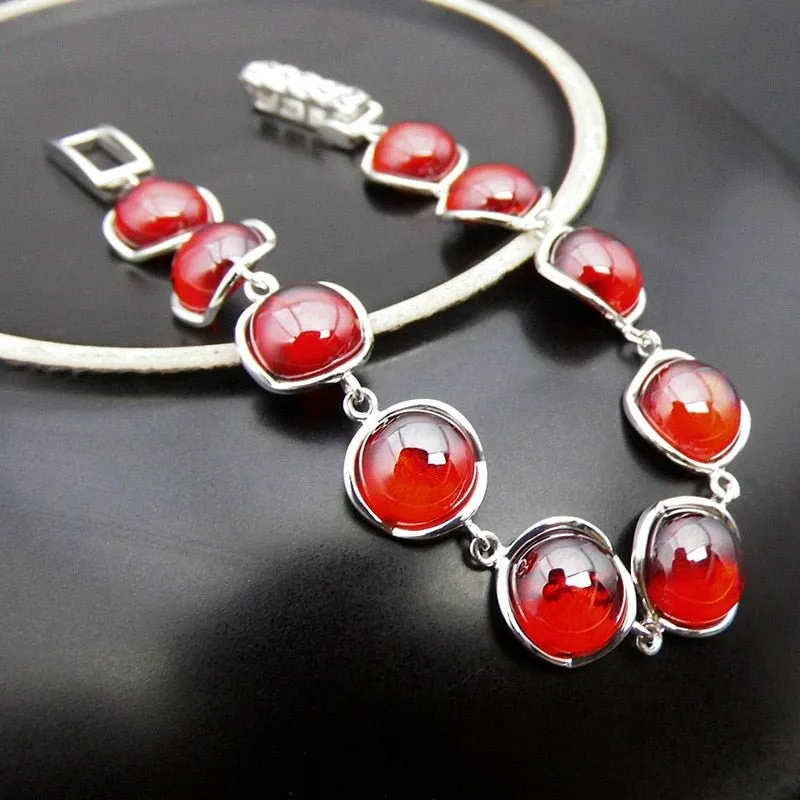 Polished Garnets in S925 Thai Silver Bracelet