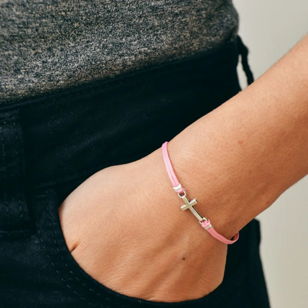 Women bracelet with silver cross charm and pink cord, Christian gift for her