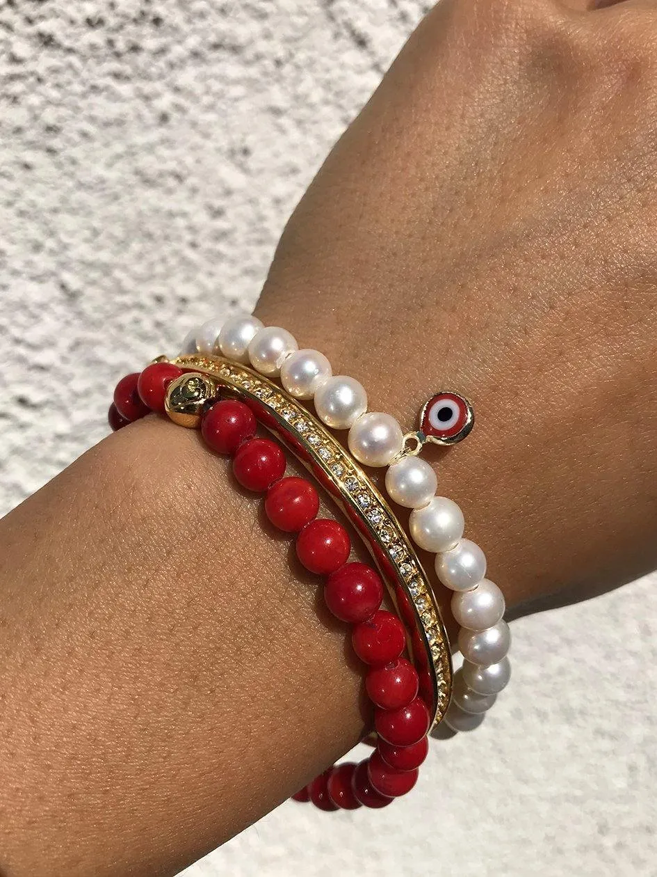 Wristband with White Pearls and Red Evil Eye Charm